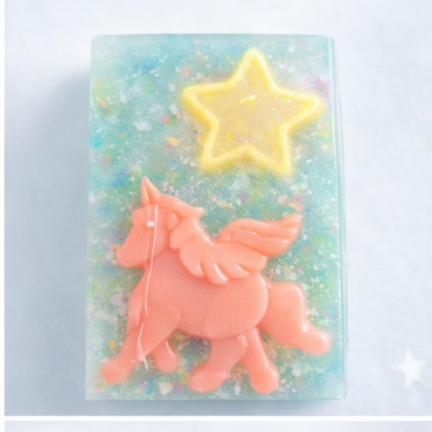 Unicorn Dreams Soap - teal base with pink unicorn and yellow star