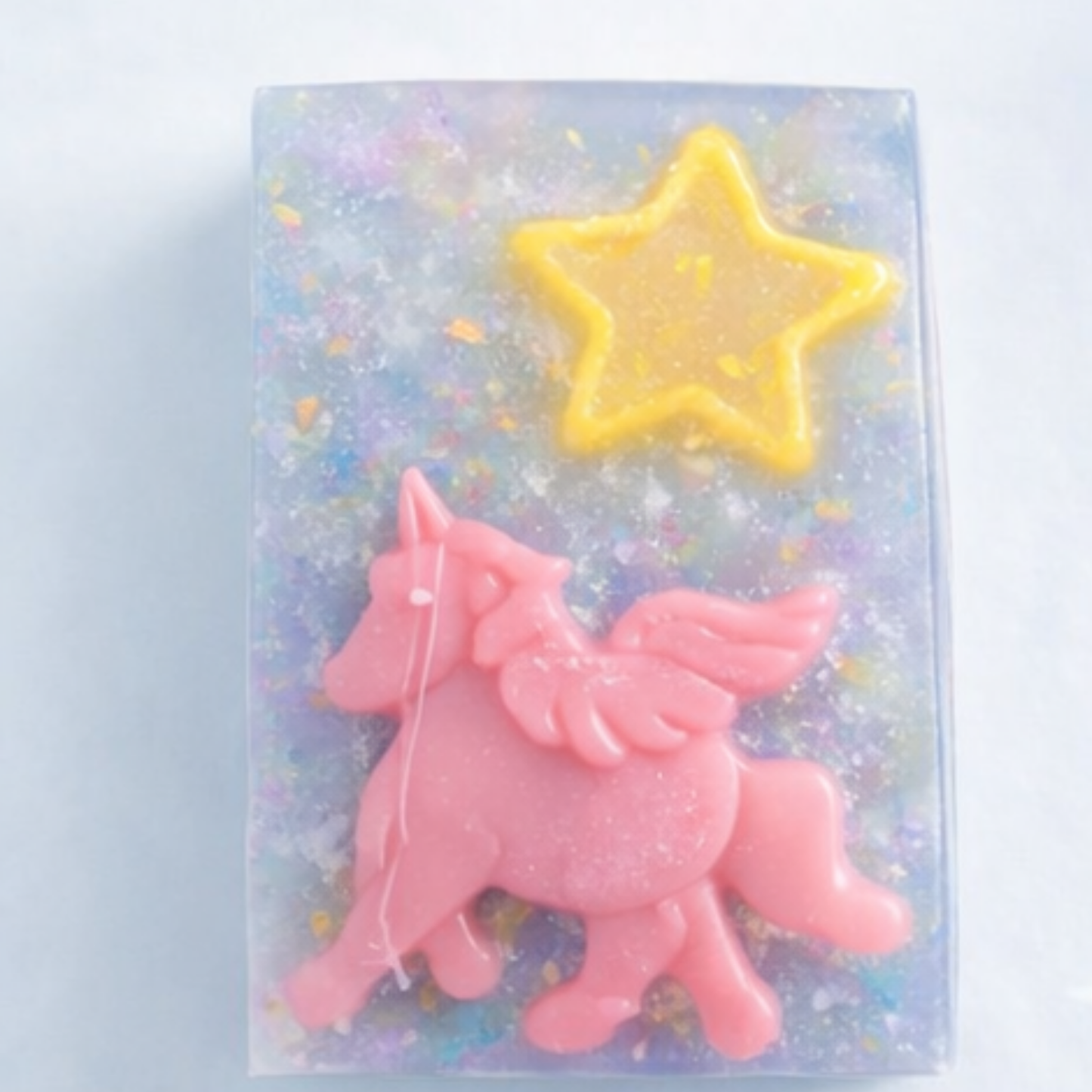 Unicorn Dreams Soap - iridescent base with pink unicorn and yellow star