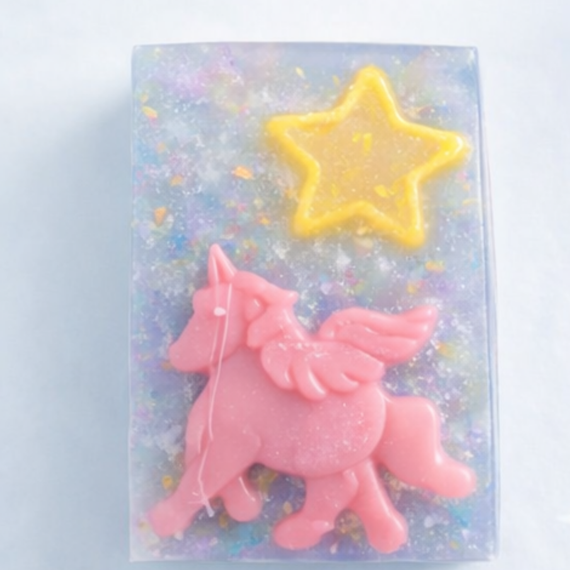 Unicorn Dreams Soap - iridescent base with pink unicorn and yellow star