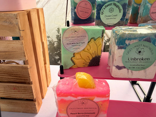 Sunlit White Tea & Thyme handcrafted soap at market display